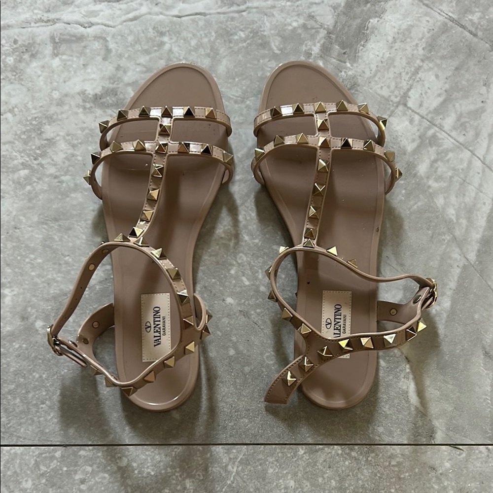 Valentino Tan Gladiator Sandals with Studded Straps
Straps need to be repaired.